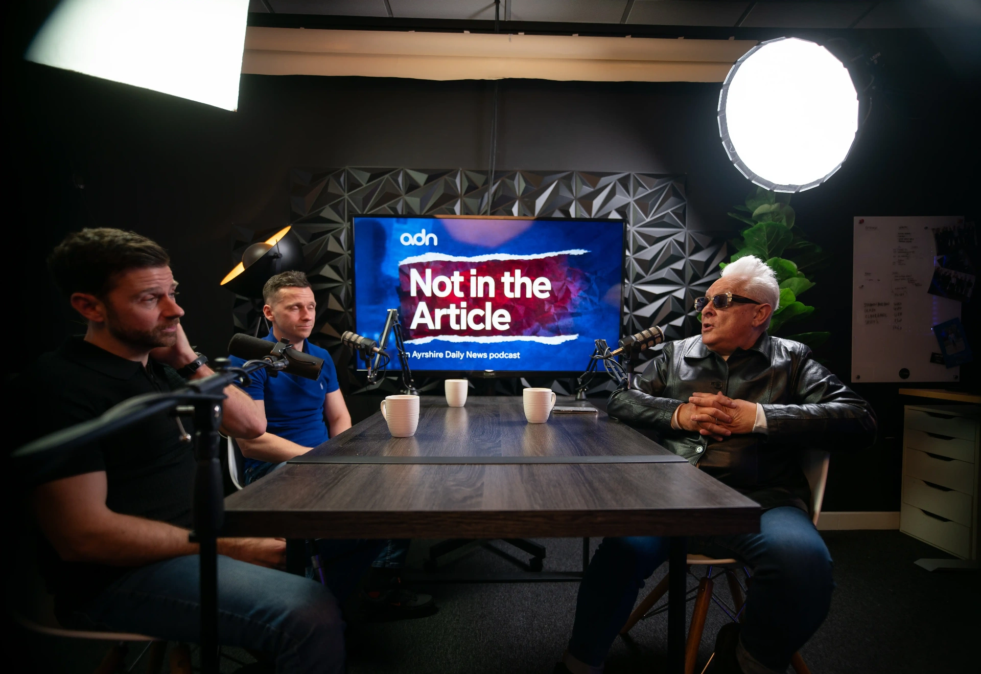 ADN podcast studio recording with hosts and guest